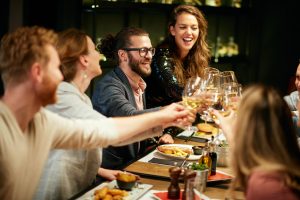 restaurant guests cheers wine